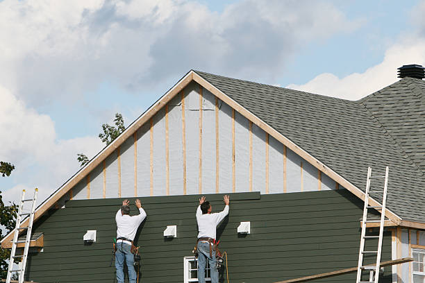 Professional Siding Contractor technician working in Adamsville, PA